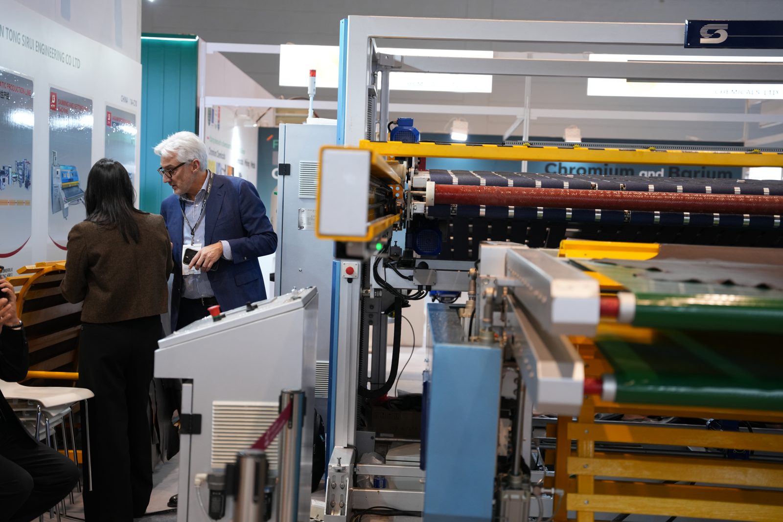 Demonstrating the SREE stacking machine with real leather at APLF 2026